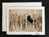 Red-winged Blackbird in a Field of Cattails
